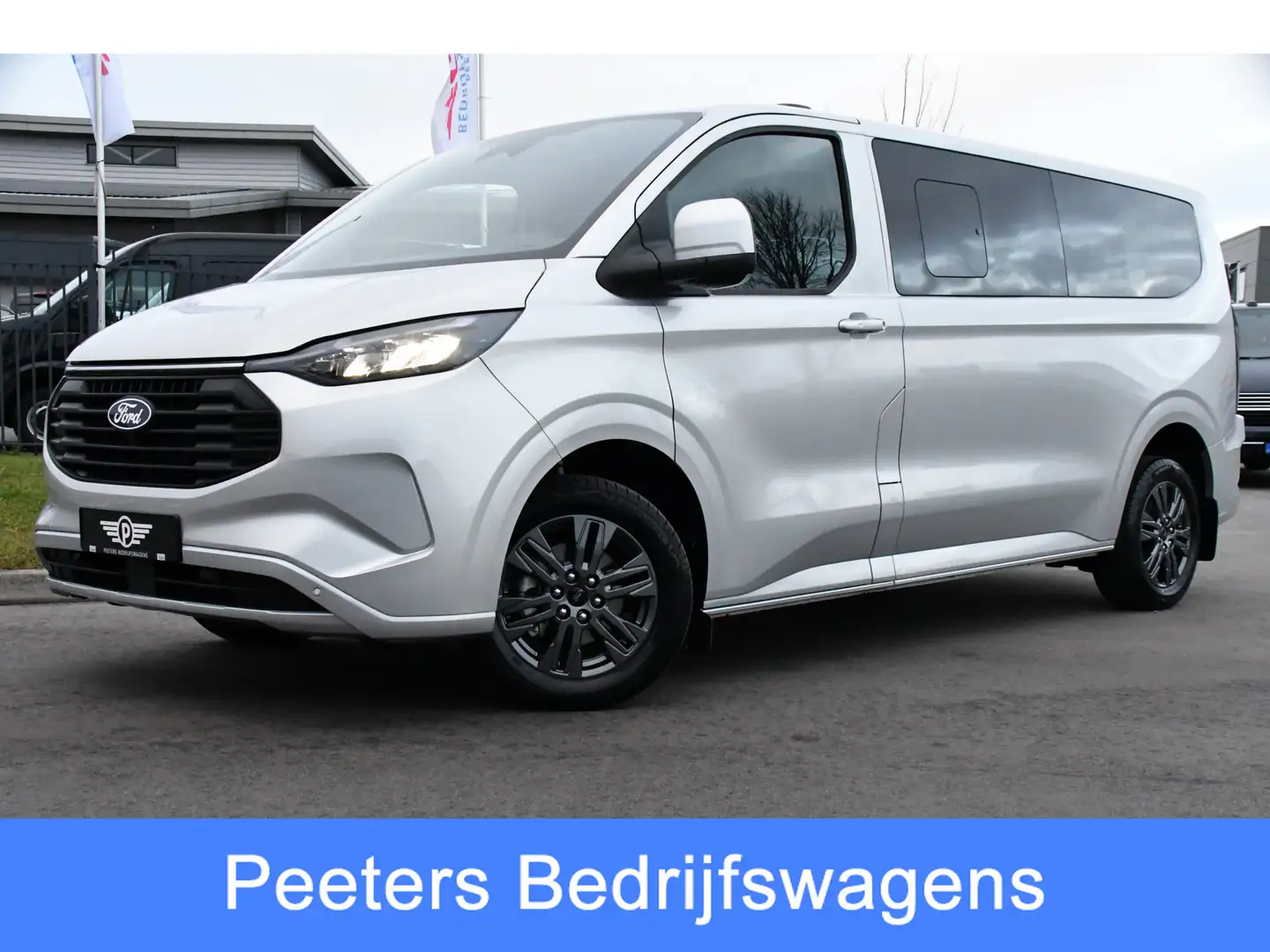 Ford Transit Custom 340 2.5 PHEV L2H1 Limited 9 Persoons, Marge, Virtu Argento - 1