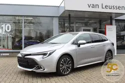 Toyota Corolla Touring Sports Getinte ramen, Inductieladen voor smartphones, Alarm, Stoelverwarming, Garantie, Parkeerhulp achter, Lendensteun, Lichtmetalen velgen
