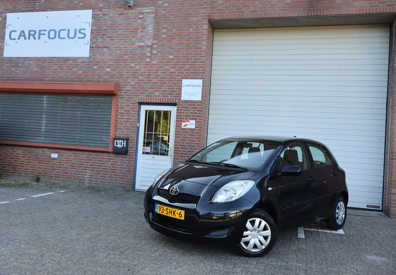 Toyota Yaris 1.0 VVTi Acces Dealer APK 1e eigenaar PDC Airco NA Negro - 1
