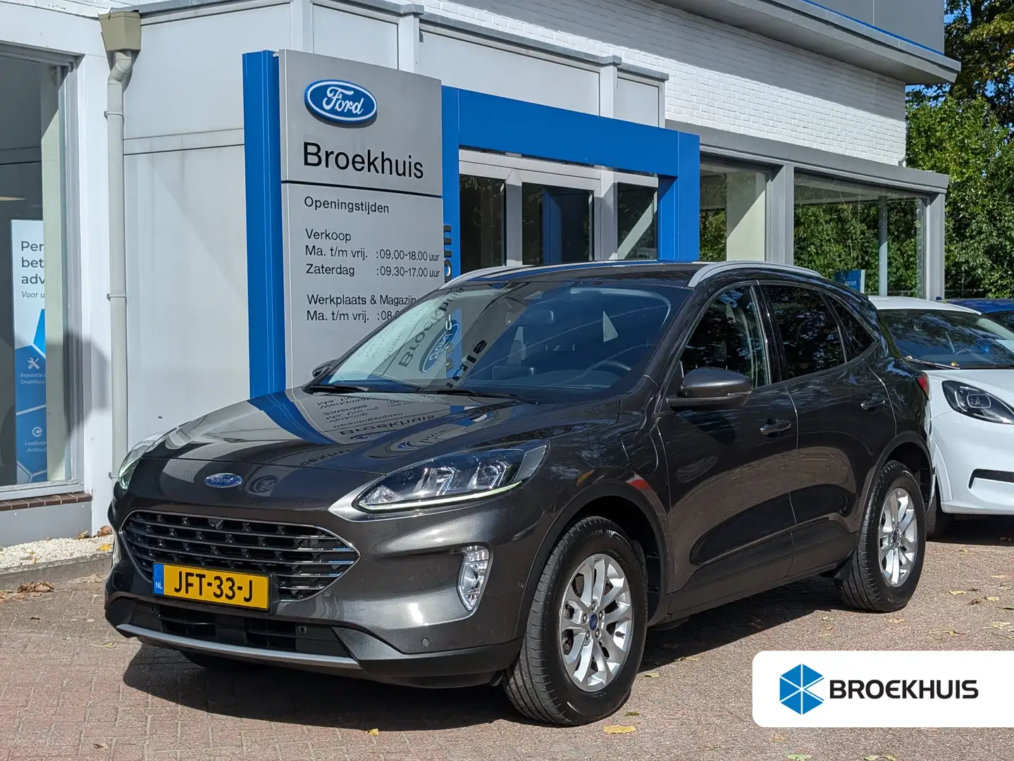 Ford Kuga 2.5 PHEV Titanium 225pk | Winter Pack | Keyless | Grijs - 1