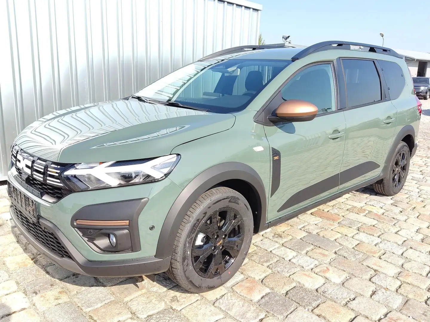 Dacia Jogger Extreme + 1.0 ECO-G 101 PS LPG 7-SitzerNavi-Ka... Grün - 1