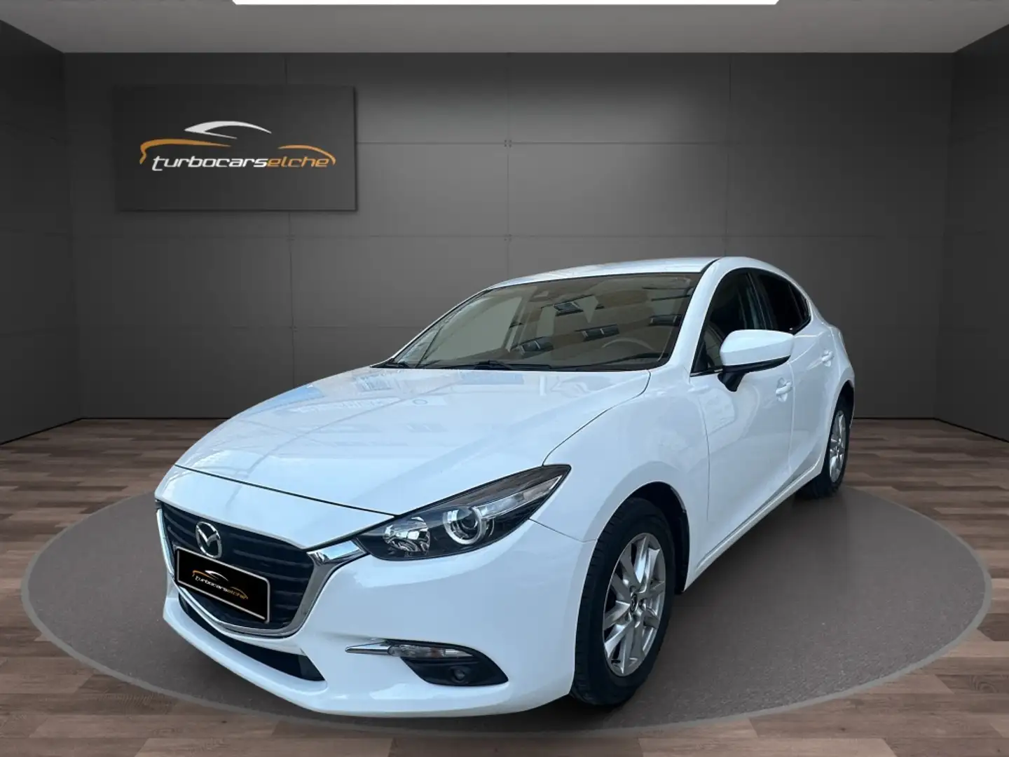 Mazda 3 1.5 Evolution Navegador 77kW Blanc - 1