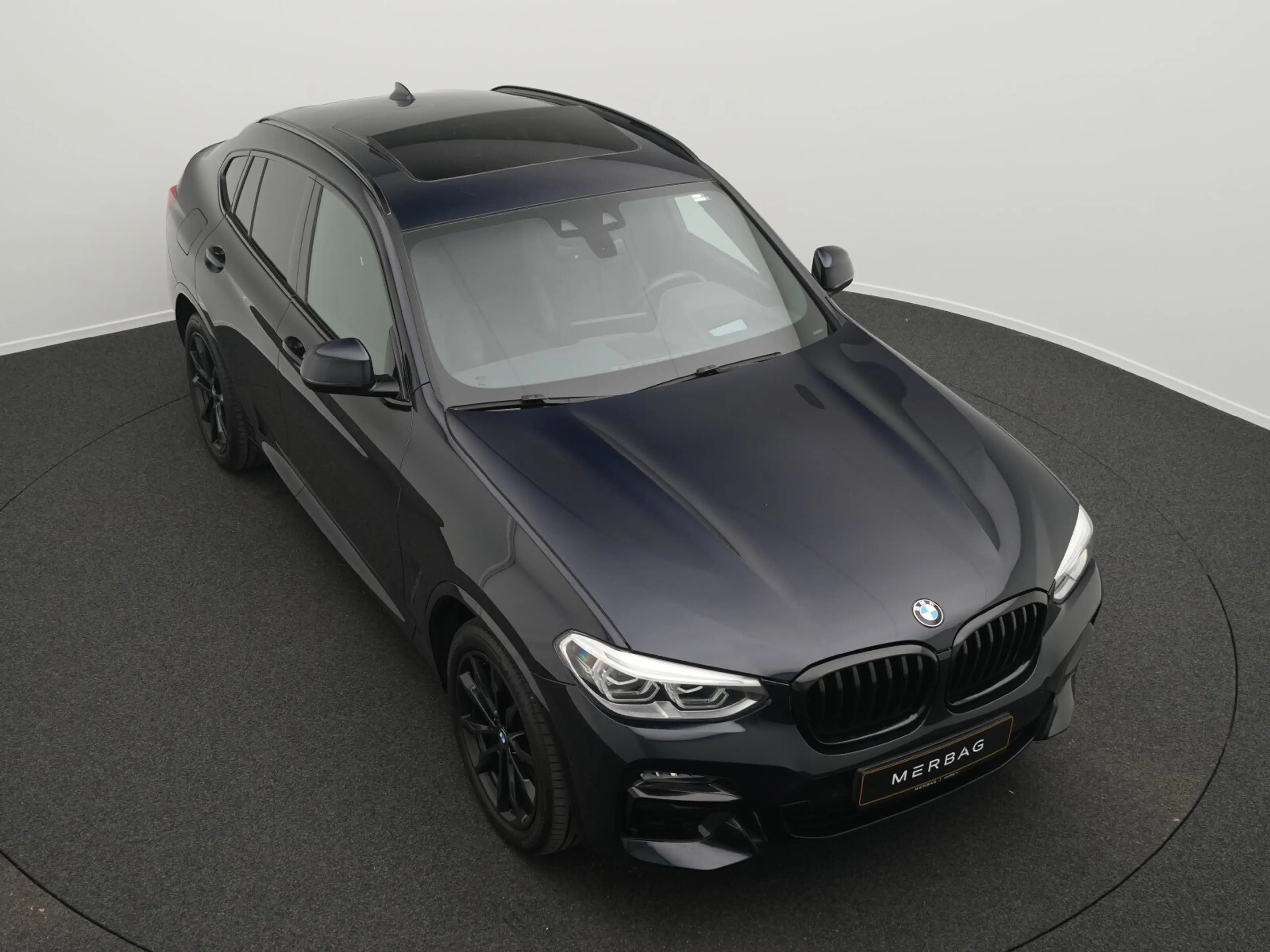 BMW M4 X4 M40d — photo 12