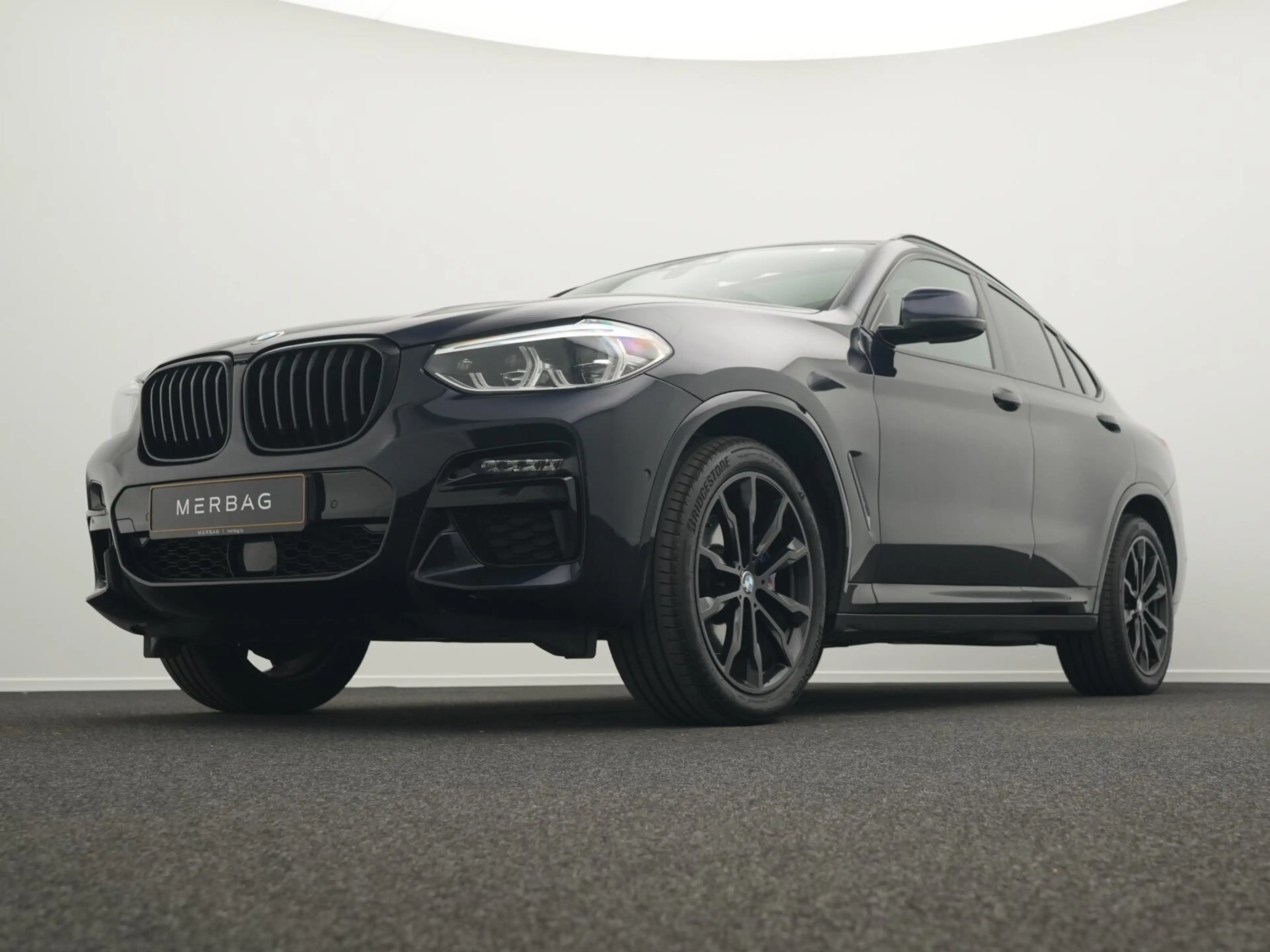 BMW M4 X4 M40d — photo 10