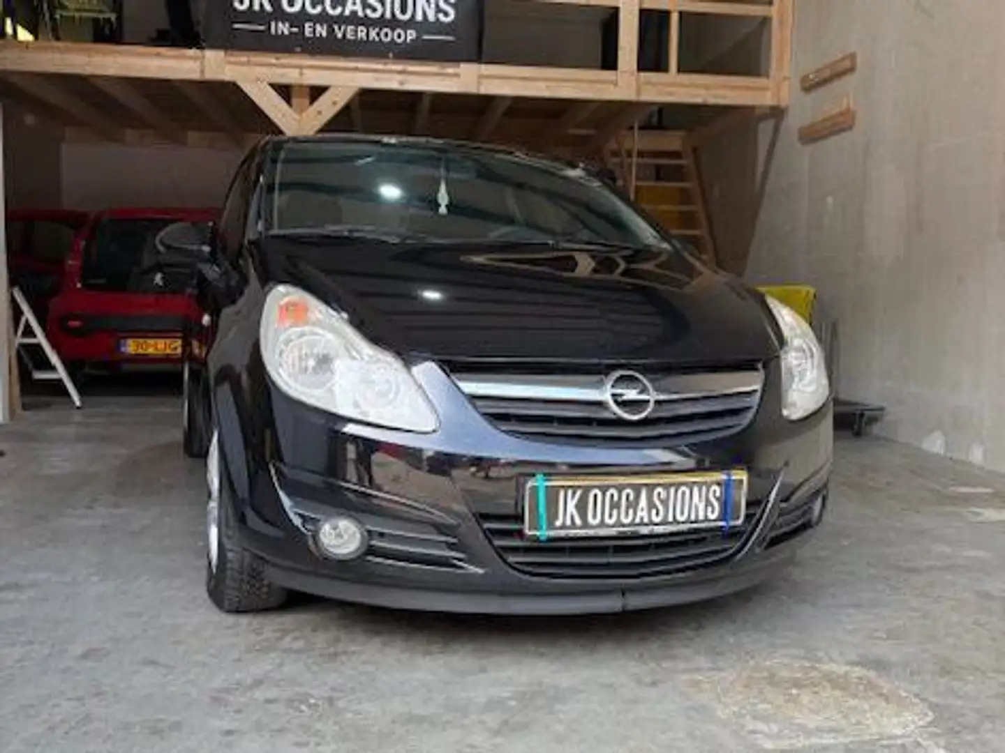 Opel Corsa 1.2-16V Enjoy Zwart - 1