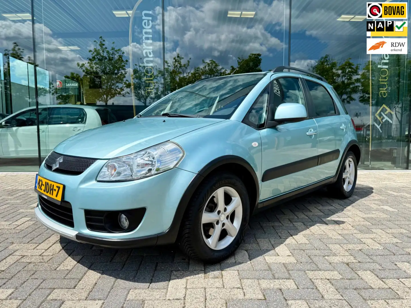 Suzuki SX4 1.6i Exclusive, Trekhaak, Climate, KeyLess, Navi Blue - 1