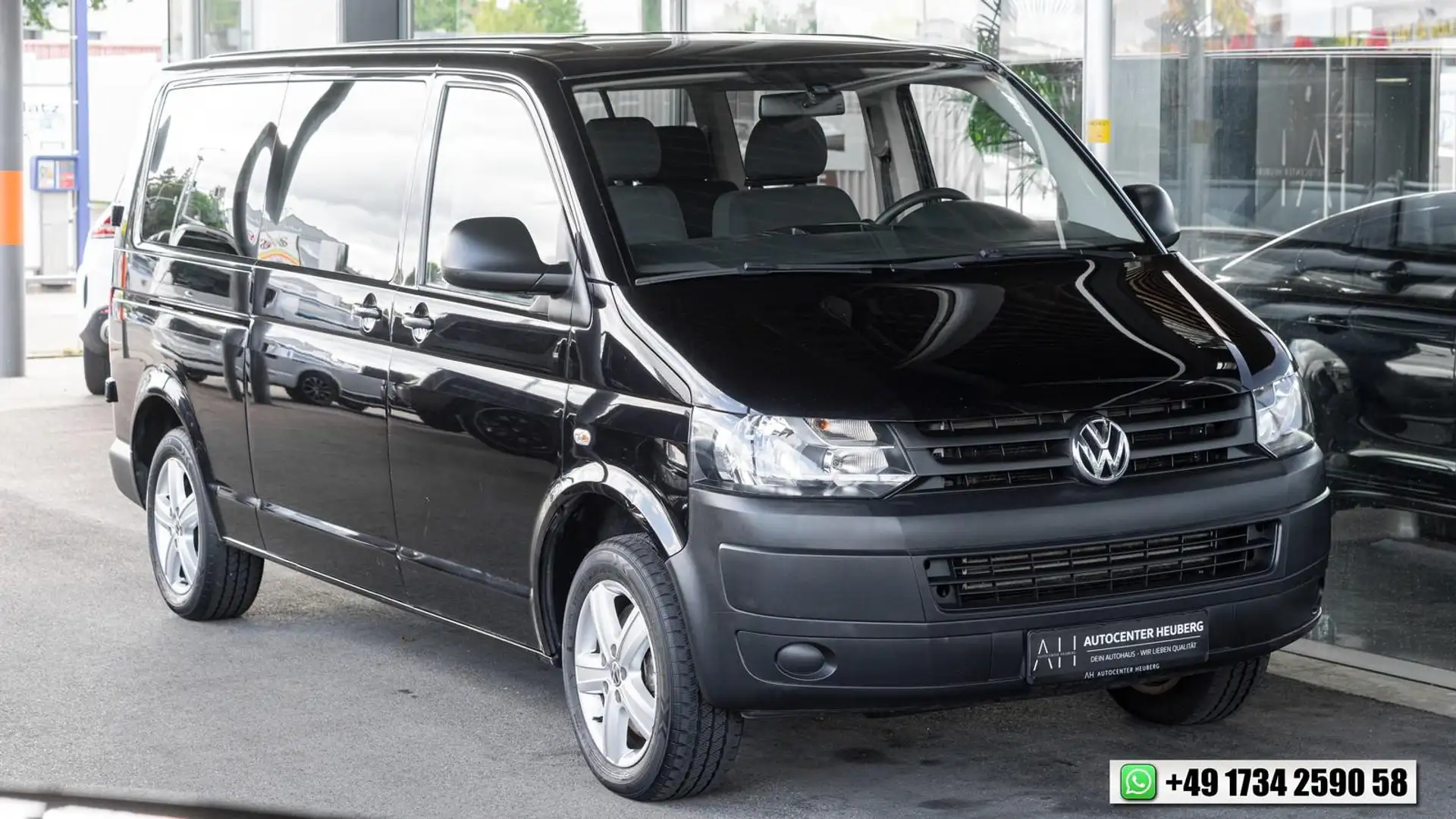 Volkswagen T5 Caravelle *9-SITZER*KLIMA*TÜV 04.2027* Schwarz - 1