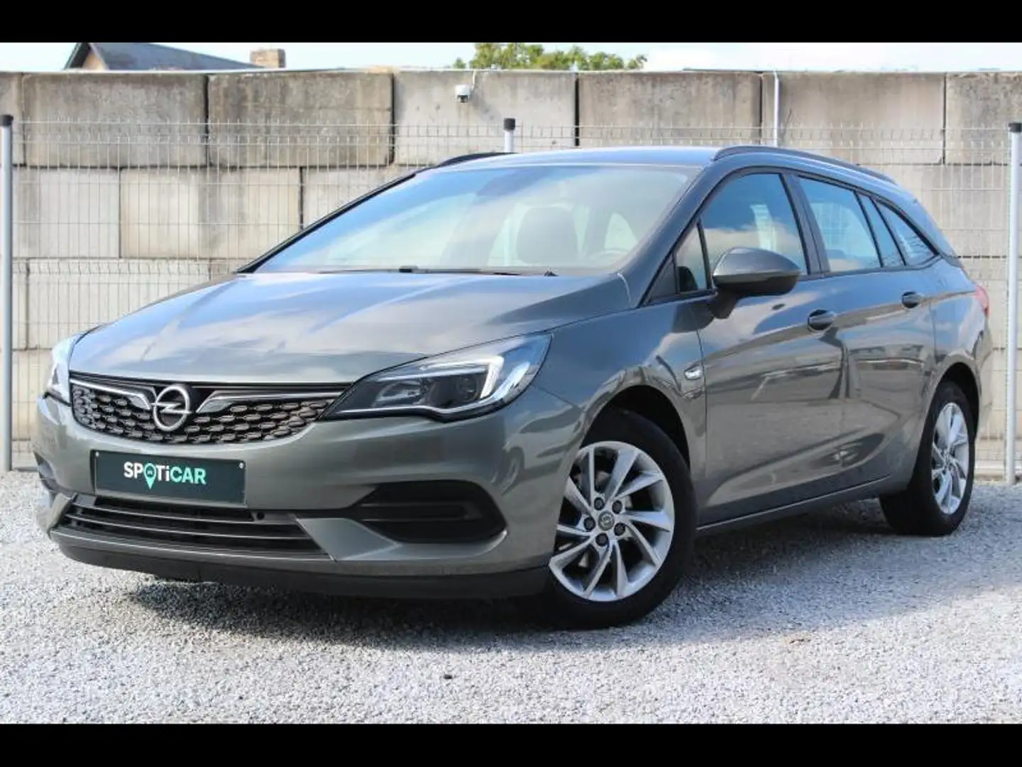 Opel Astra Sports Tourer -GPS-AIRCO-P.SENS V+A- Grau - 1