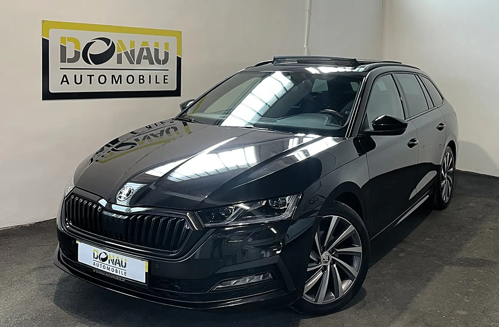 Skoda Octavia Combi 2,0 TDI Style DSG * Sportpaket * ACC * Pa... Schwarz - 1