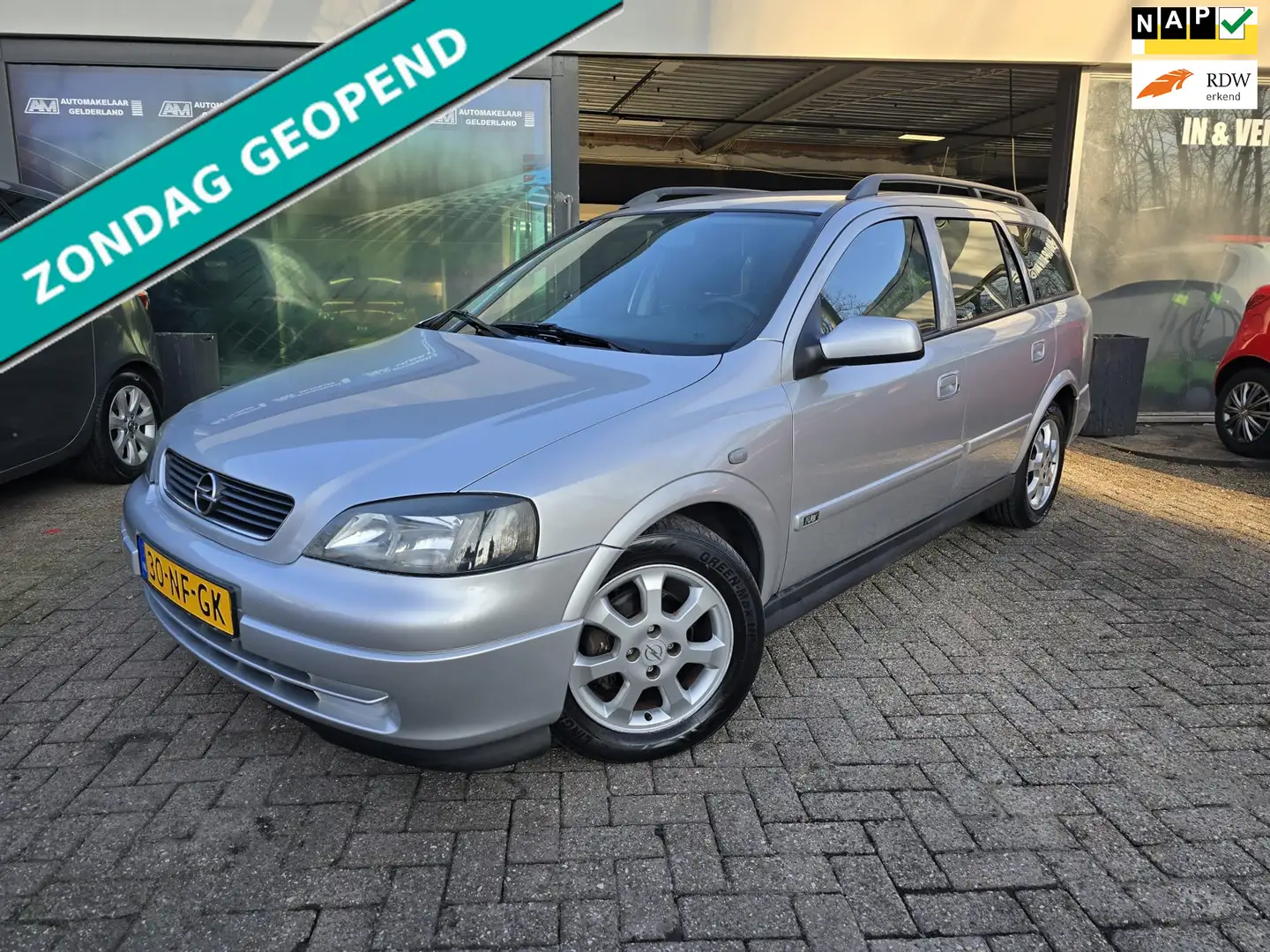 Opel Astra Wagon 1.6 Njoy | AUTOMAAT | 2E EIGENAAR | NIEUWE A Grijs - 1