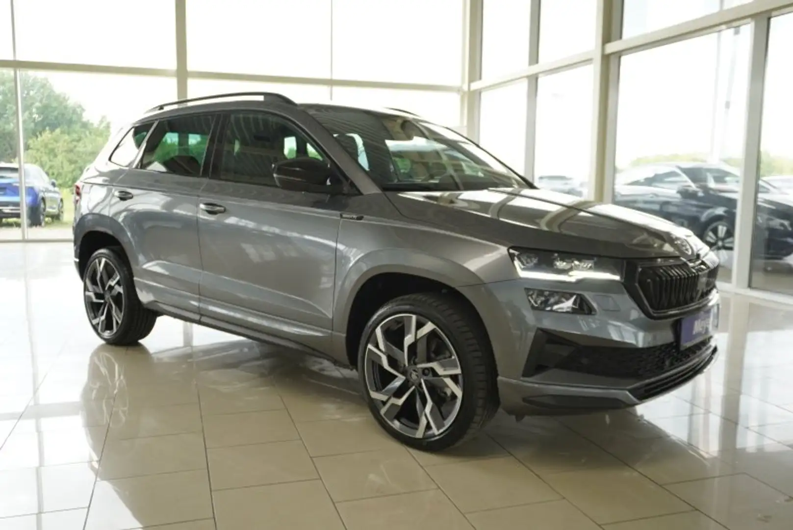Skoda Karoq Sportline 2,0TSI DSG 4x4 aAHK/Pano/4*J.Gar/Matrix/ Grau - 1