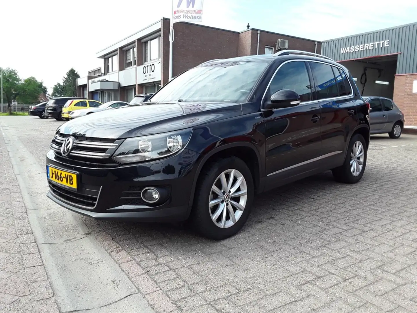 Volkswagen Tiguan 1.4 TSI SPORT&STYLE-LOUNGE / 150 PK / NAVI / TREKH Schwarz - 1