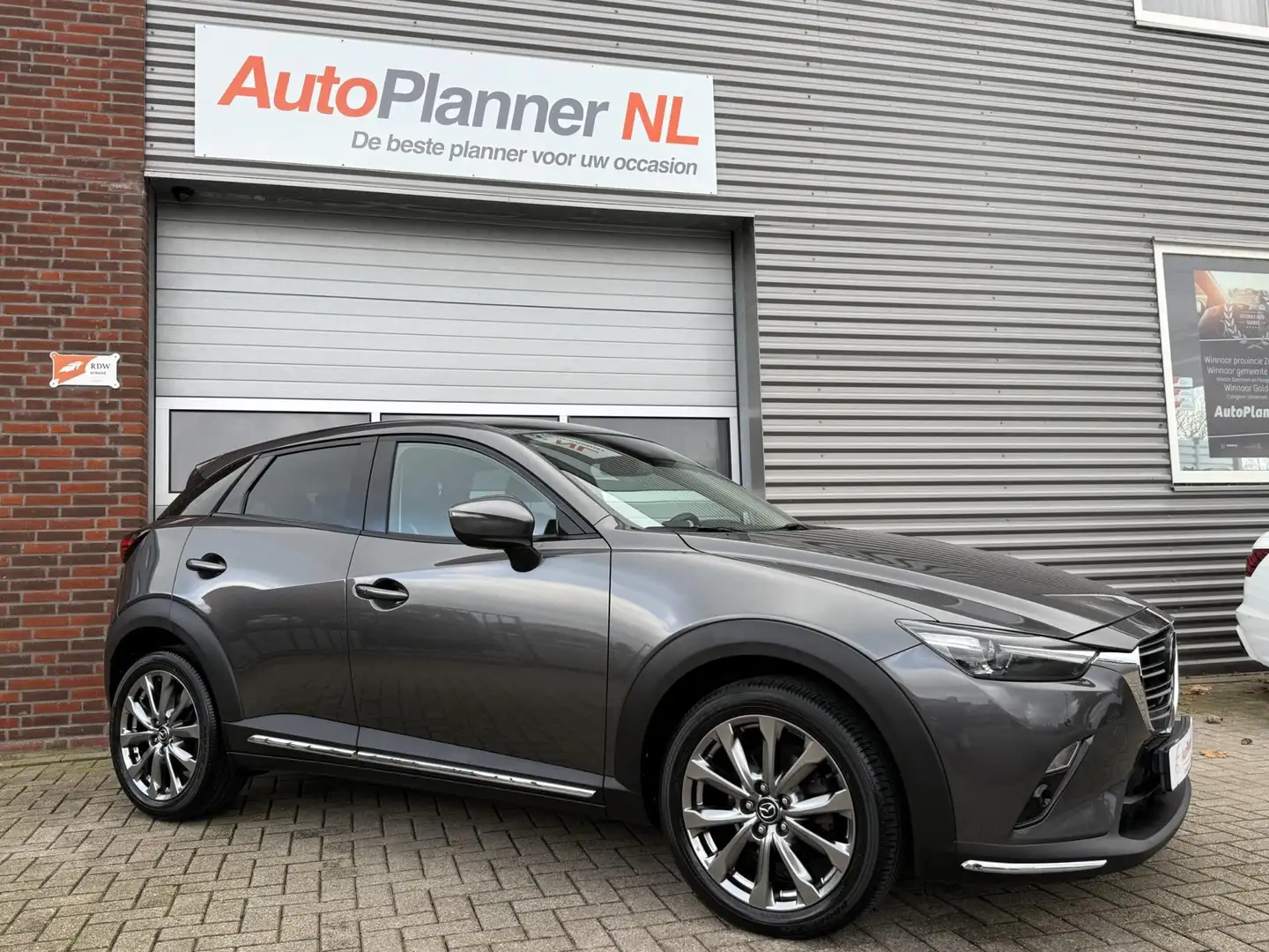 Mazda CX-3 2.0 SkyActiv-G 120 GT-Luxury! Camera! 1e Eigen.! Grijs - 2