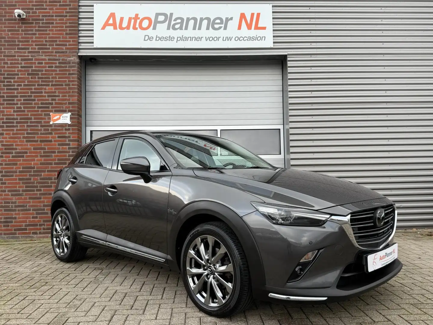 Mazda CX-3 2.0 SkyActiv-G 120 GT-Luxury! Camera! 1e Eigen.! Grijs - 1