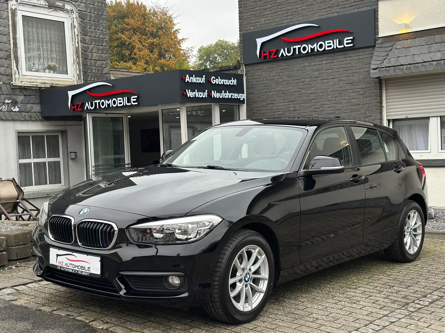 BMW 118 i M-Paket Advantage*TEMP*PDC*SHZ*MFL*LMF*TÜV Schwarz - 1
