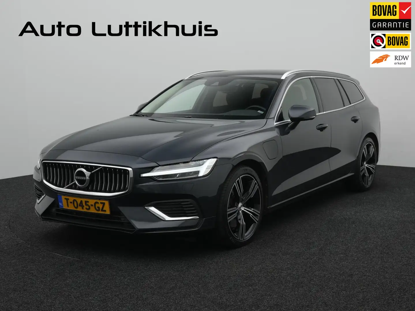 Volvo V60 2.0 T8 Twin Engine AWD Inscription Grijs - 1