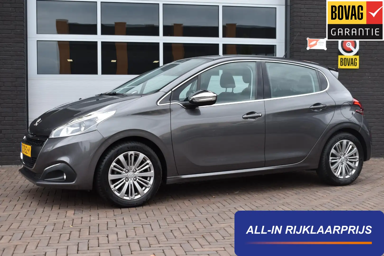 Peugeot 208 1.2 PureTech Blue Lease Executive | Navi | Cruise Grijs - 1