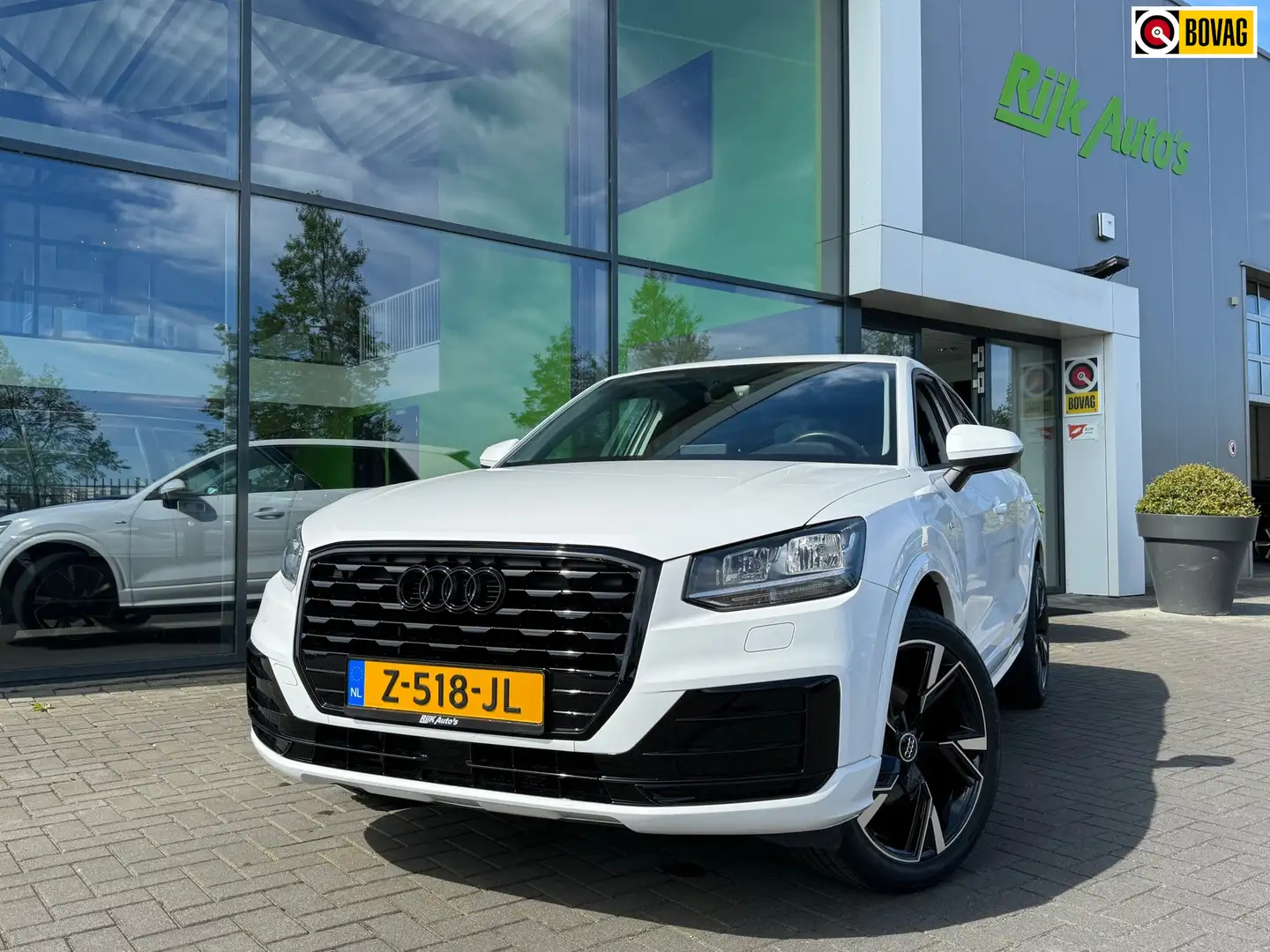 Audi Q2 30 TFSI S-line * Black Pack * Stoelverwarming * PD Wit - 1