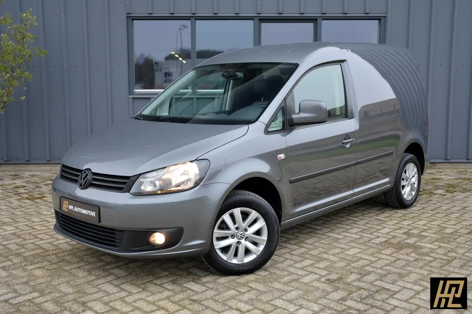 Volkswagen Caddy 1.6 TDI 102pk DSG / RNS310 / PDC / Bluetooth / Lmv Grijs - 1