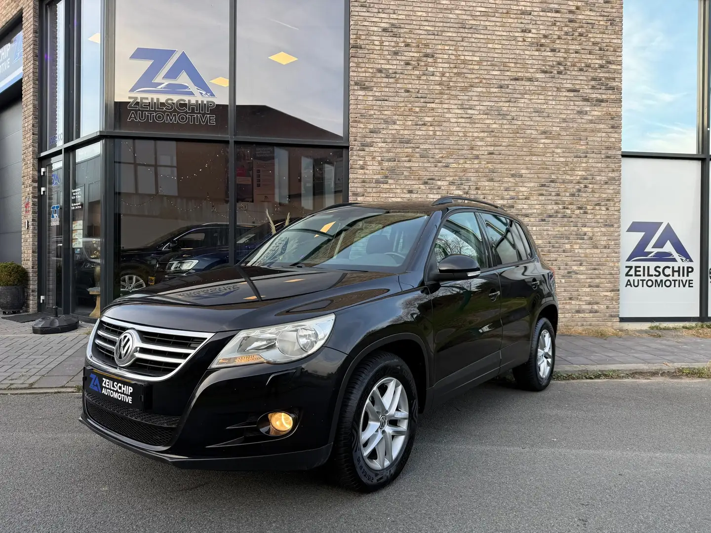 Volkswagen Tiguan 1.4 TSI Sport&Style Navi|Cruis|Trekhaak|Pdc|BT| Negro - 1