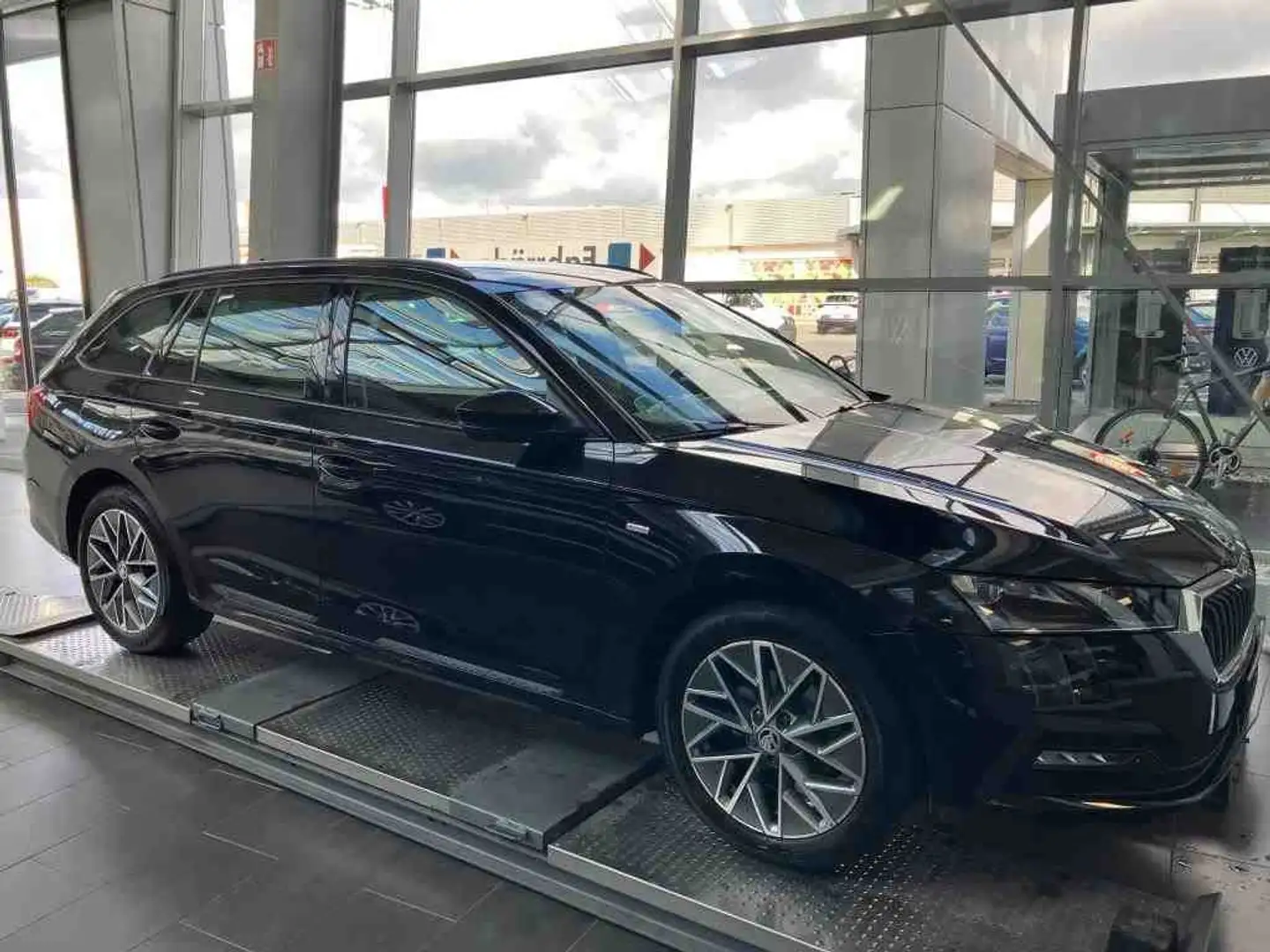 Skoda Octavia Combi 2.0 TDI DSG TOUR *MATRIX *NAVI *SHZ *ALU *A Zwart - 2