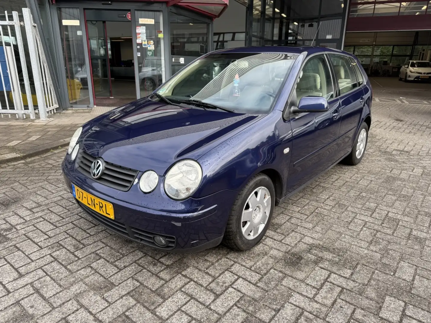 Volkswagen Polo 1.4-16V Highline Blauw - 1