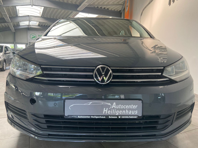 Volkswagen Touran DSG 7-Sitzer Navi Tempo Sitzheizung PDC — photo 10