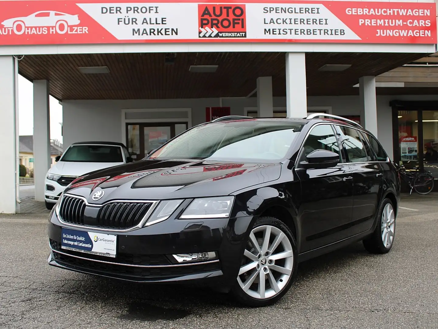 Skoda Octavia Combi 2,0 TSI 4x4 Style DSG *1.Besitz, LED, ACC... Schwarz - 1