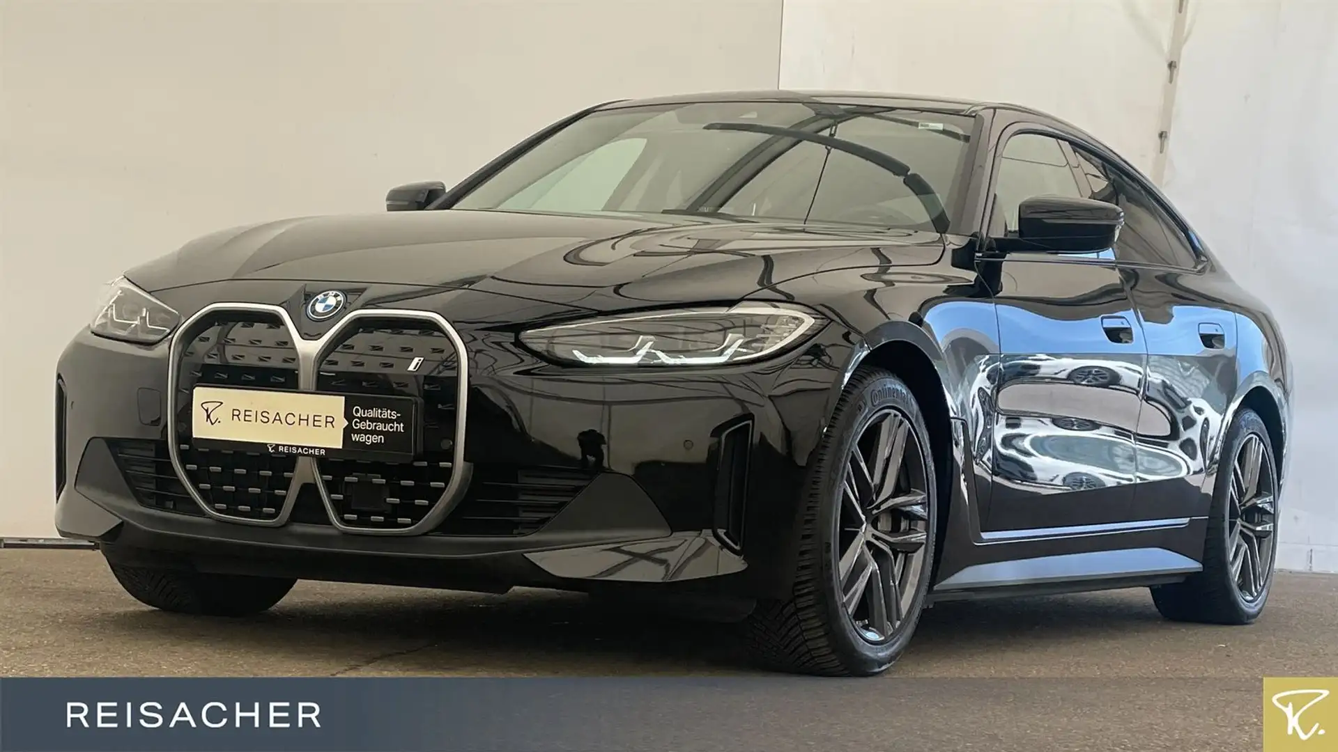 BMW i4 eDrive35 Gran Coupé LC+ KomfortZ RFK HiFi 18" Zwart - 1