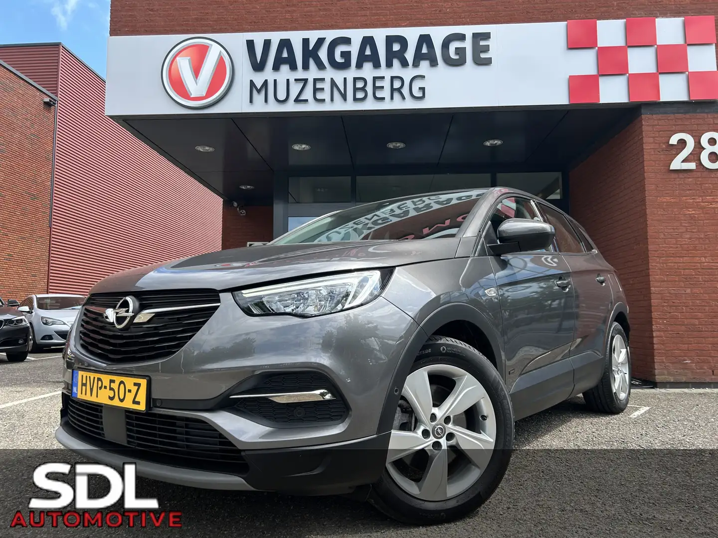 Opel Grandland 1.6 Turbo Hybrid Business Elegance PHEV // NAVI + Grijs - 1