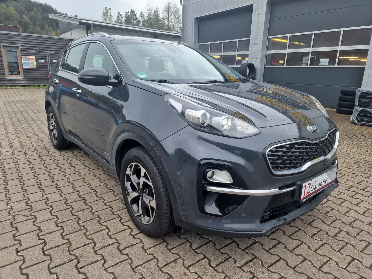 Kia Sportage Vision 4WD-NAVI-KAMERA-XENON-AHK-Shzg-Lhzg-AUTOMAT Grau - 1