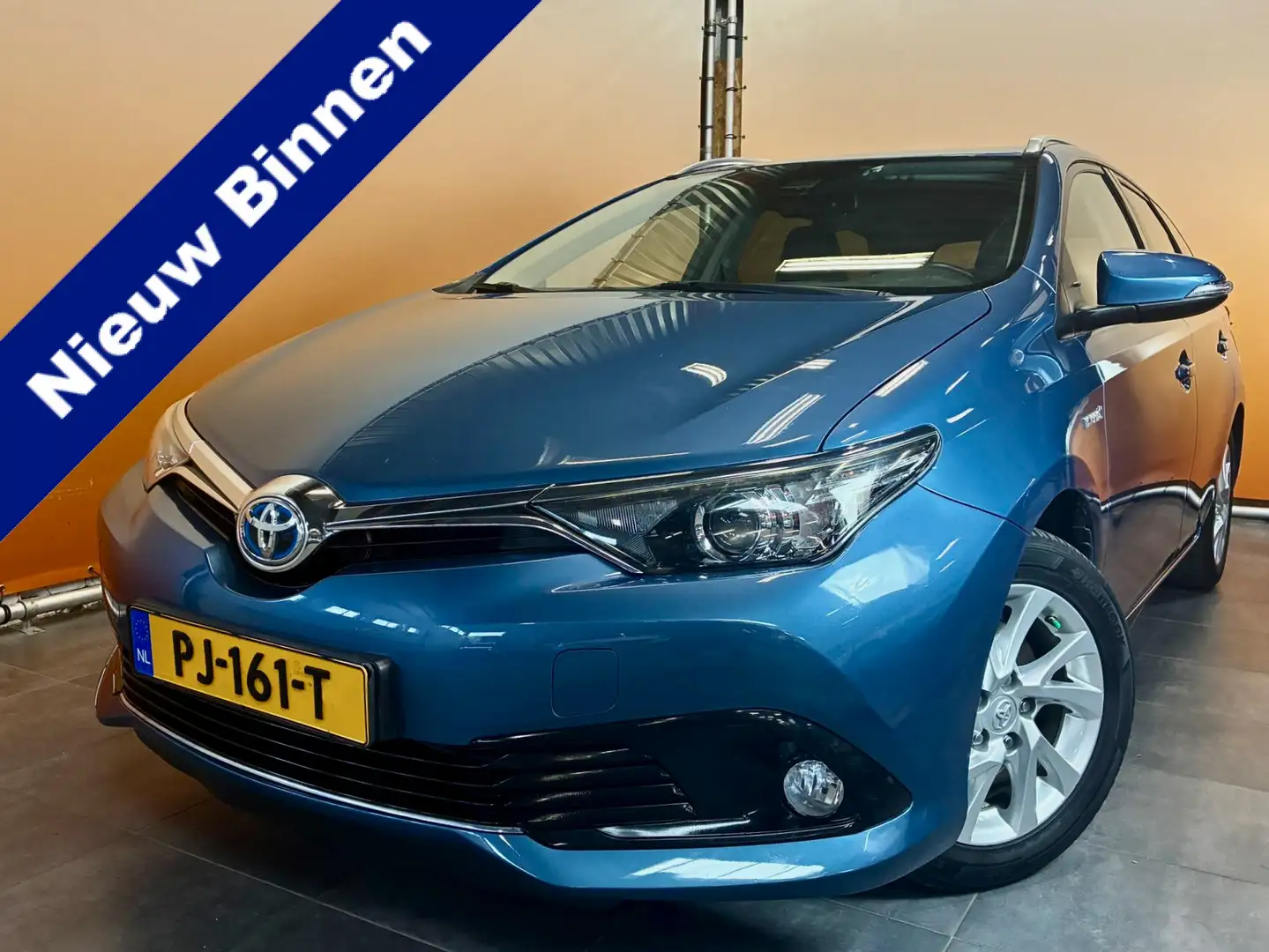 Toyota Auris Touring Sports 1.8 Hybrid Dynamic Go dealer onderh Blauw - 1