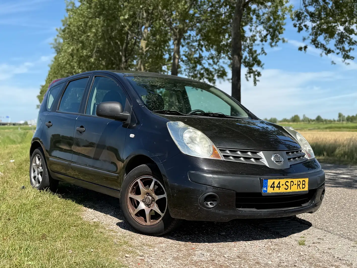 Nissan Note Note 1.4 Visia Zwart - 1