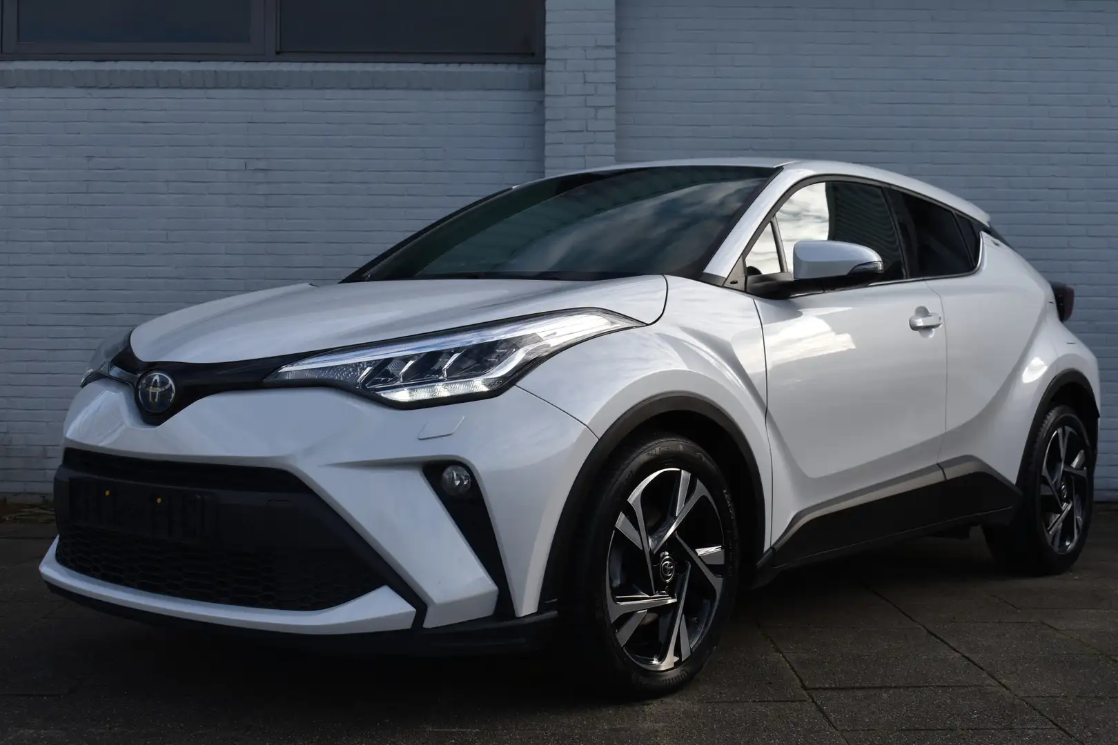 Toyota C-HR 1.8 Hybrid Style Limited Automaat 122pk | Stuur&st Wit - 1