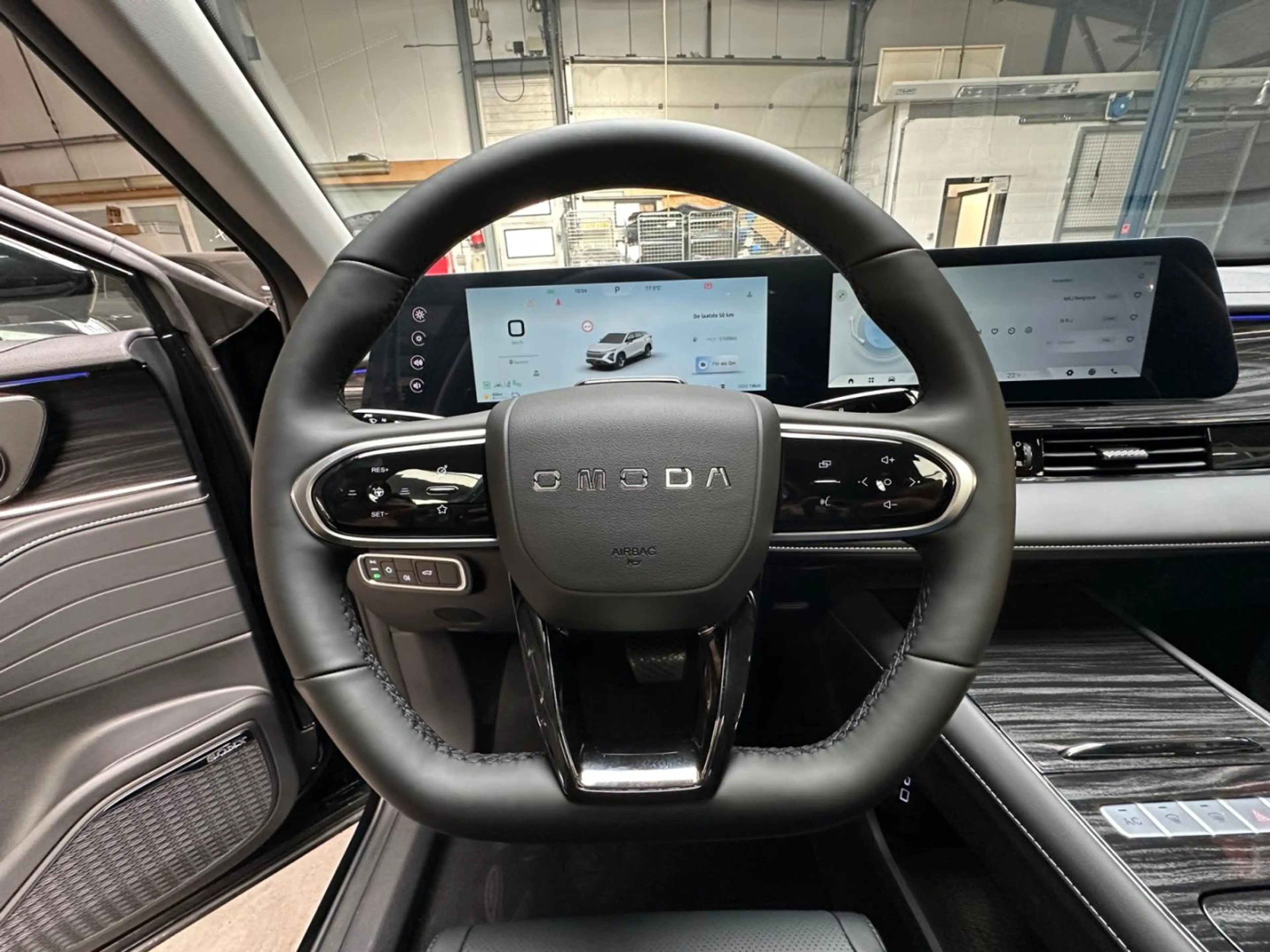Omoda 5 hev premium — photo 11