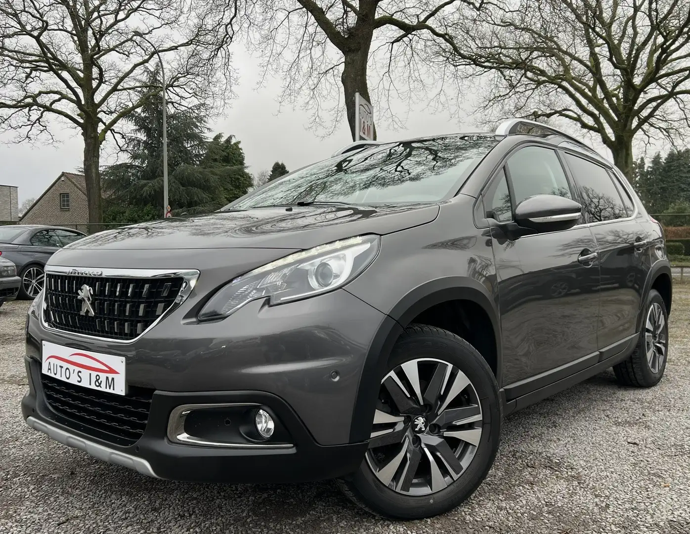 Peugeot 2008 1.2i benzine automaat Allure 57Dkm Airco Garantie! Grijs - 1