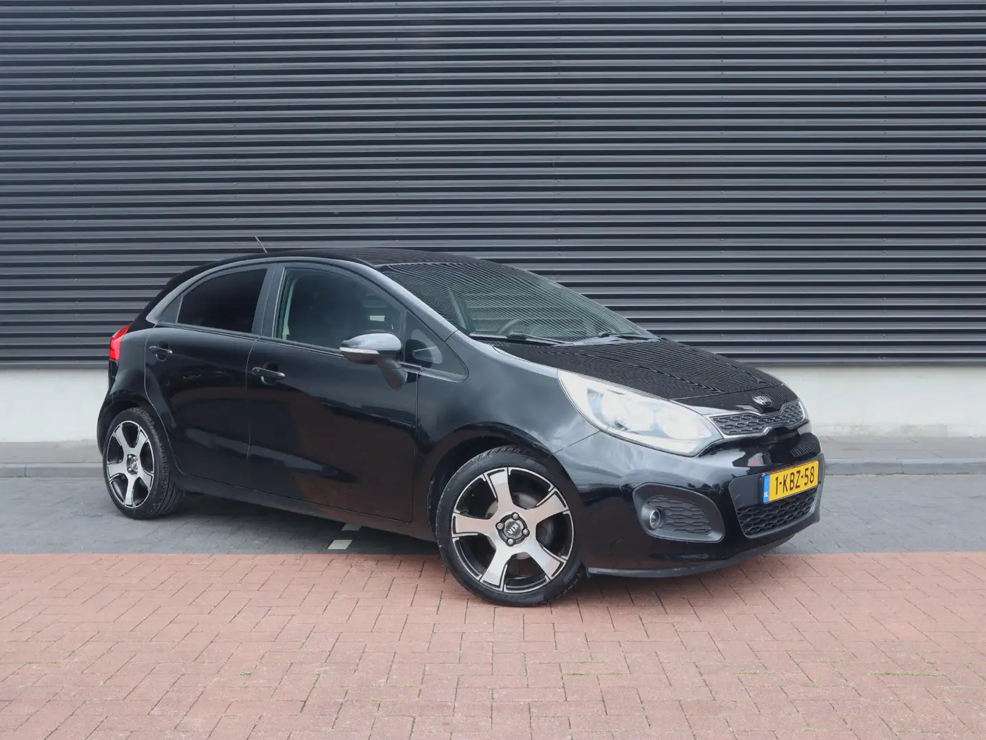 Kia Rio 1.2 CVVT Super Pack | Clima | Cruise | PDC | Multi Noir - 2