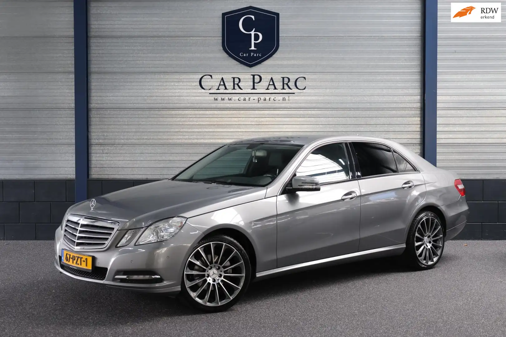 Mercedes-Benz E 200 CGI XENON/LEER/PDC/LMV/CRUISE/ECC/12 MND GARANTIE! Grijs - 1
