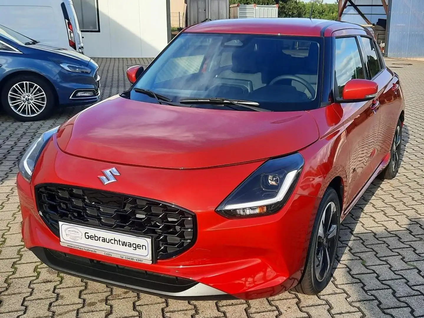Suzuki Swift Swift 1.2 Hybrid MT Comfort+*Navi*RFK*ACCu.v.m Rouge - 2