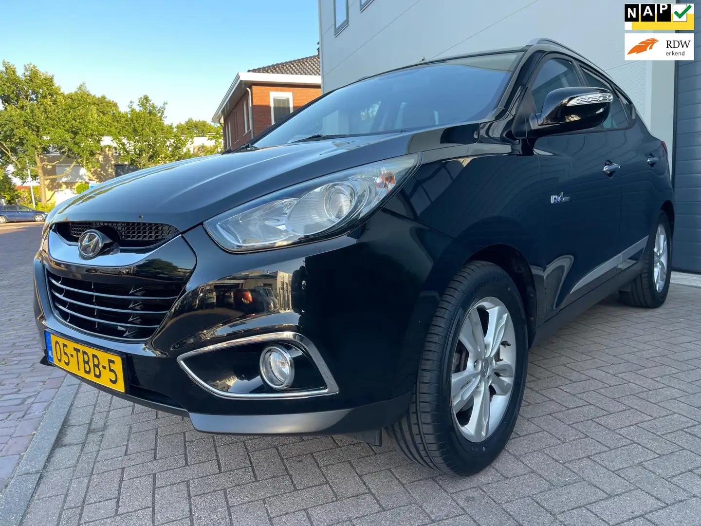 Hyundai iX35 1.6i GDI Style/Camera/Climate-c/Cruise-c/AUX/Trekh Zwart - 1