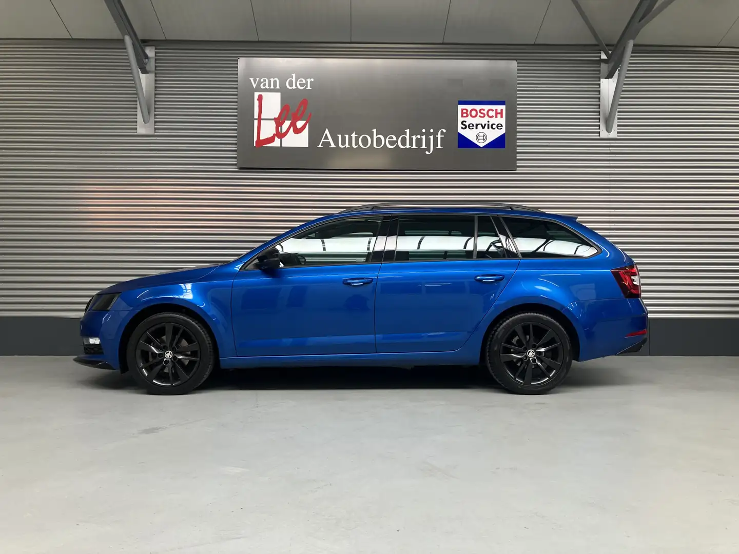 Skoda Octavia Combi 1.5 TSI SPORT/NAVI/CARPLAY/PDC V+A/TREKH/ENZ Blauw - 2