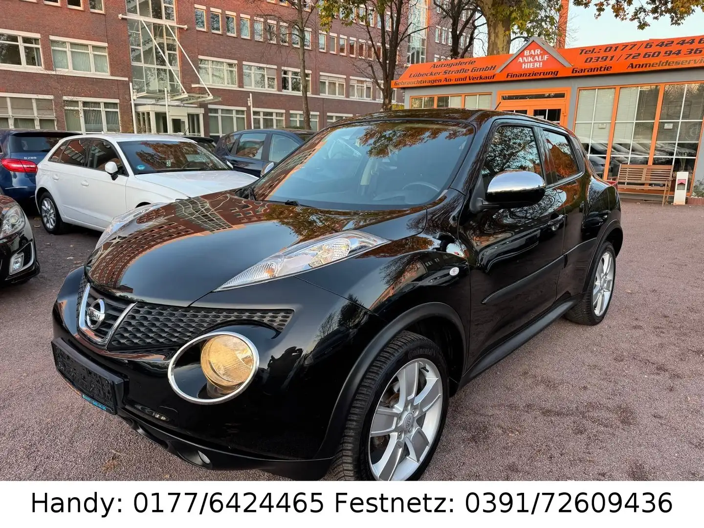Nissan Juke 1.6 KLIMAAUTOMATIK/NAVI/KAMERA/ALU/TOP! Schwarz - 1