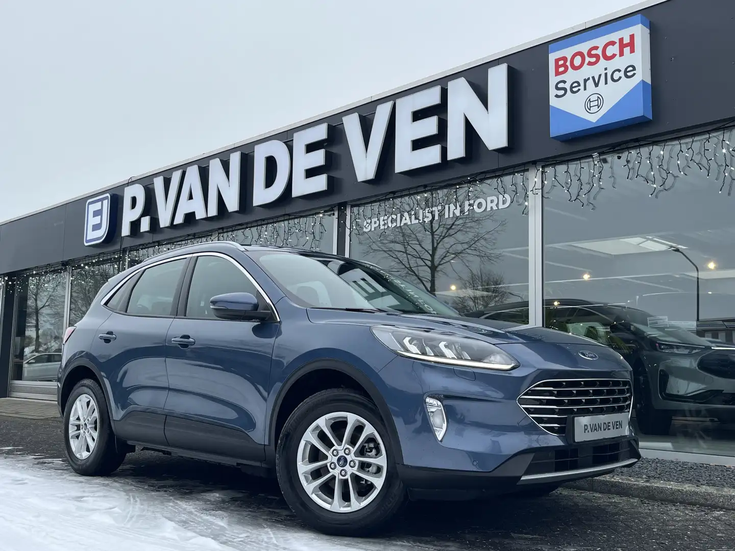 Ford Kuga 2.5 PHEV Titanium 225pk/165kW e-CVT Automaat | Kop Blau - 1