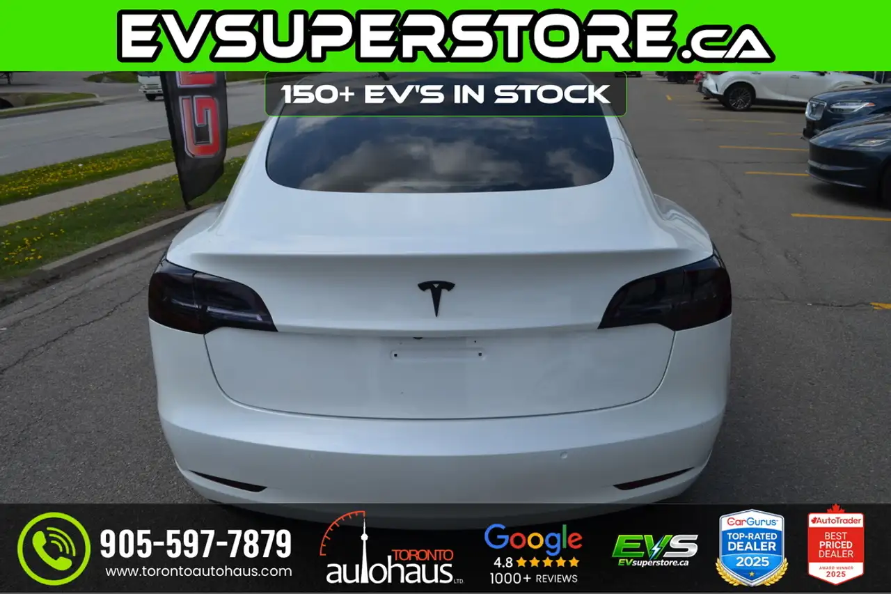 Tesla Model 3 photo Tesla Model 3