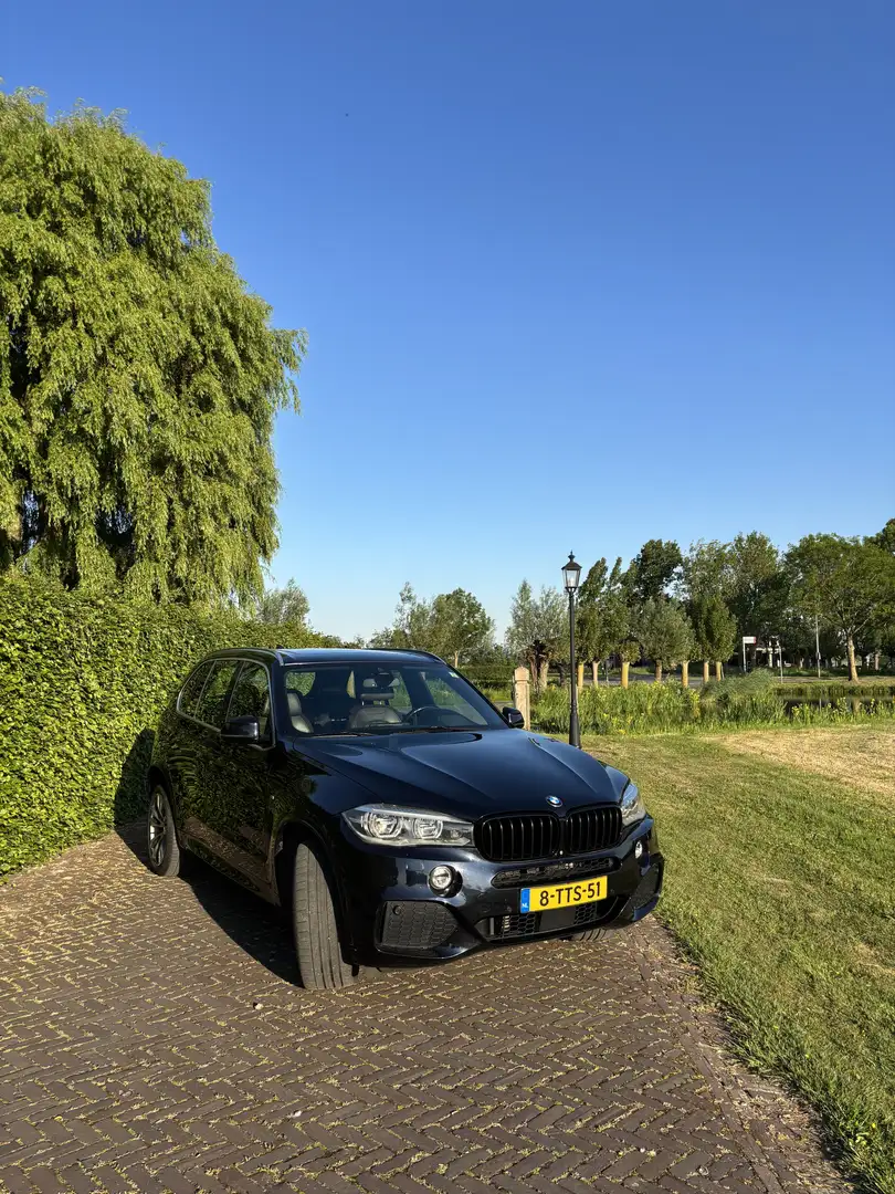 BMW X5 X drive30d M pakket Pano/leder/cam/ 7 pers. Zwart - 1