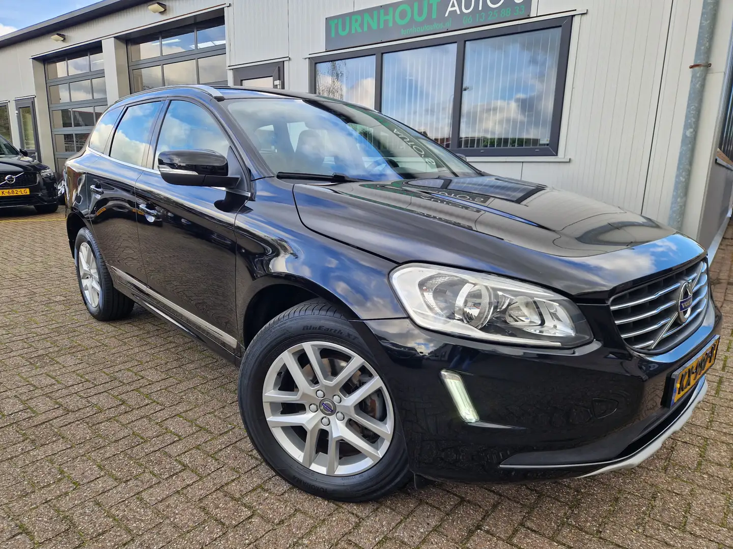 Volvo XC60 2.0 T5 FWD Summum 99.731 km Dealeronderhouden Zwart - 1