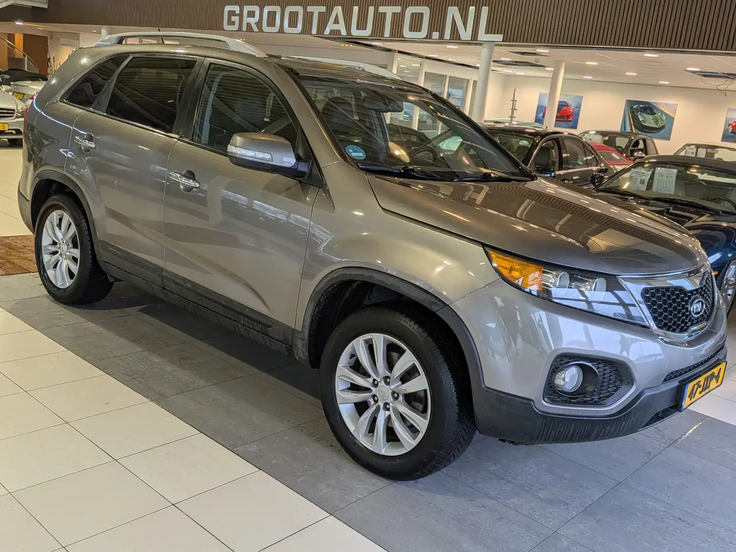 Kia Sorento 2.4 X-clusive Automaat Panoramadak, Airco, Trekhaa Gris - 1