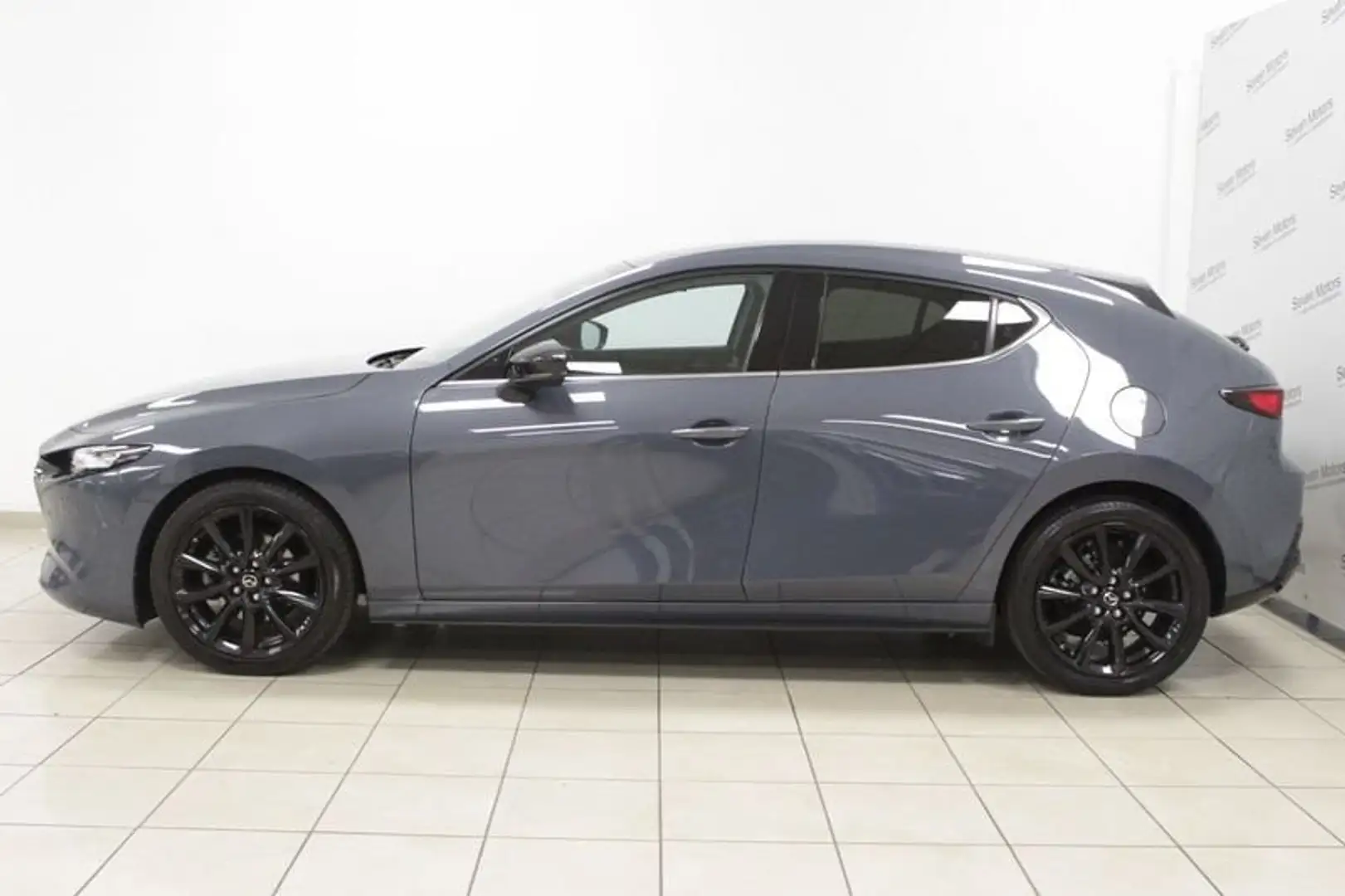 Mazda 3 2.0L eSkyactiv-G M-Hybrid 150 CV Homura Grijs - 2