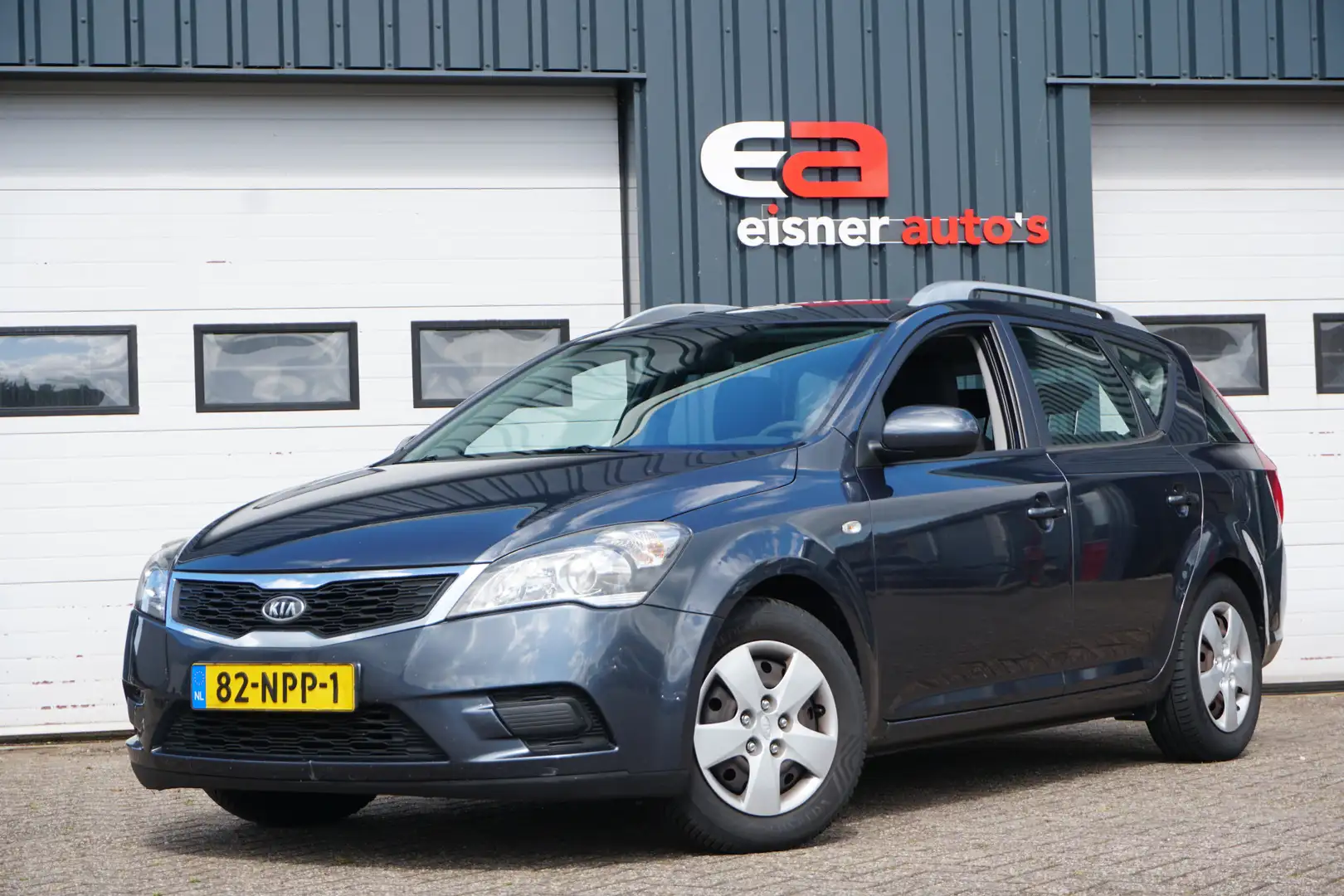 Kia Ceed / cee'd 1.4 CVVT X-tra | LEES TEKST | Grau - 1