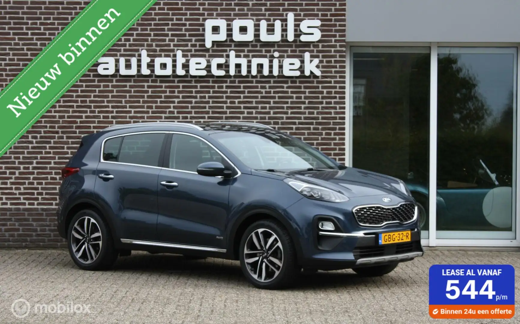 Kia Sportage 1.6 T-GDI Panoramadak, trekhaak Blauw - 1